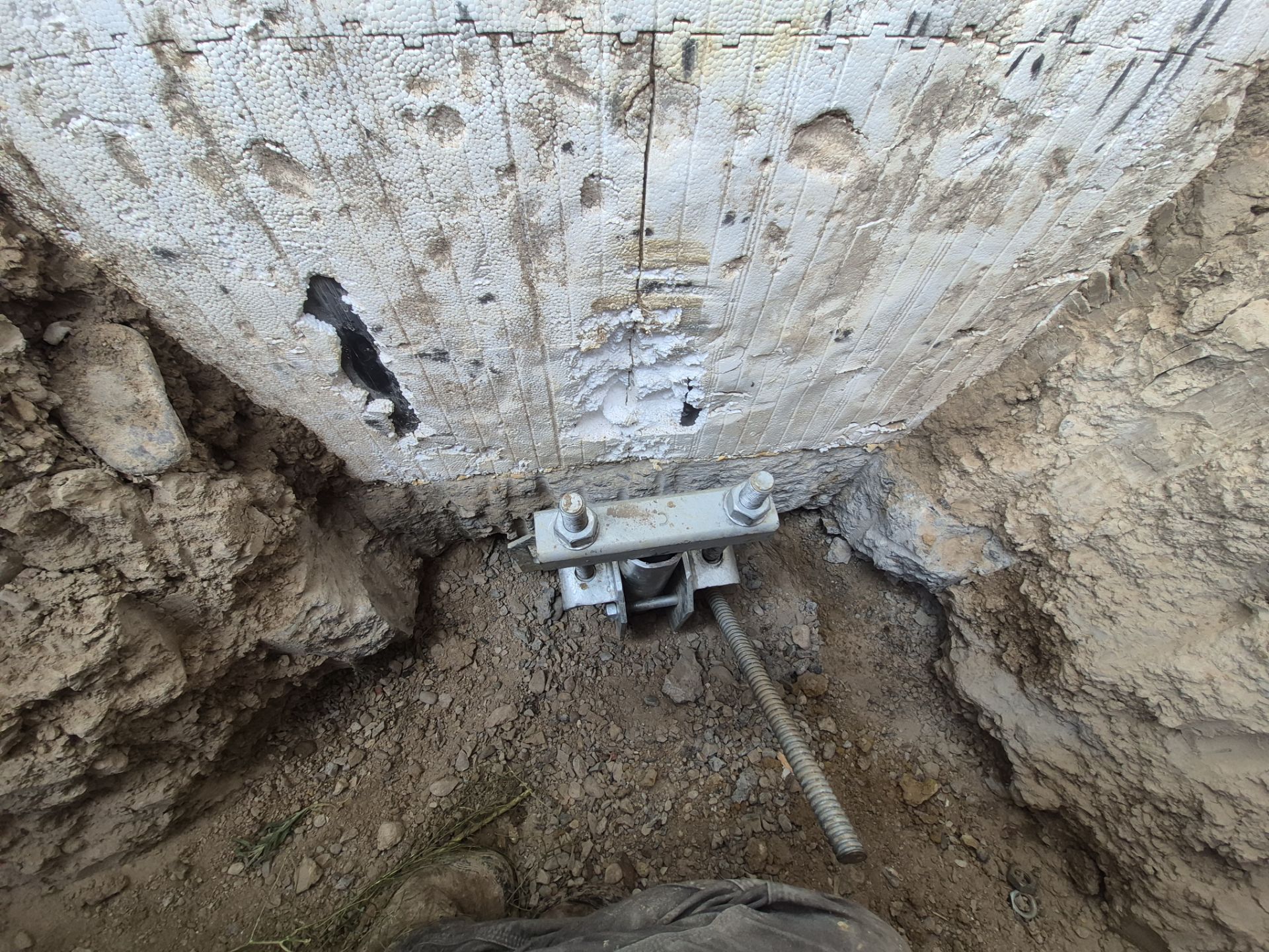 steel push pier system installed for foundation underpinning and stabilization